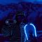 Snowboarders in LED suits